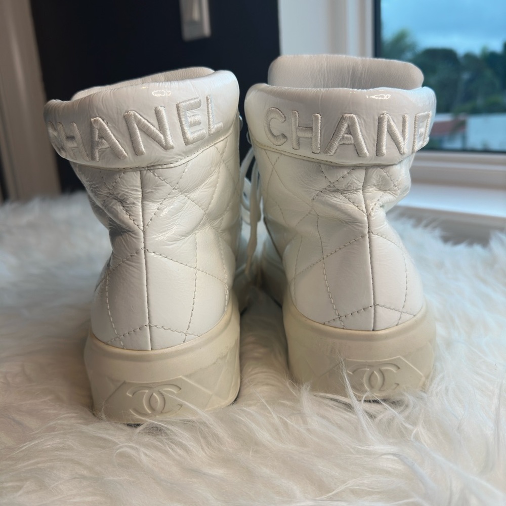 CHANEL White Quilted High-Top Sneakers